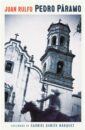 Black and white image of a colonial style church with a blurry image of a cowboy riding a horse in the foreground.